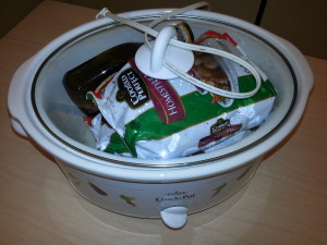 Bag of Frozen Meatballs, BBQ Sauce ready to go inside the crockpot